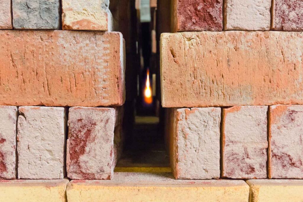 Piles of fired bricks leaving the tunnel kiln